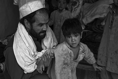 man carrying boy thumbnail