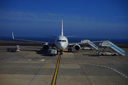 white airbus on runway thumbnail