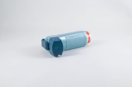 blue inhaler on white surface thumbnail