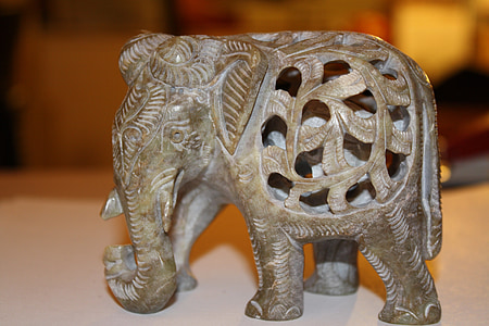 grey elephant table decor on white surface thumbnail