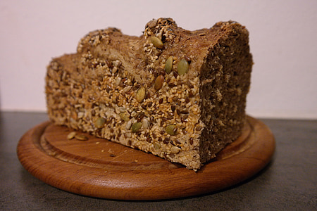 sliced cake on round brown wooden tray thumbnail