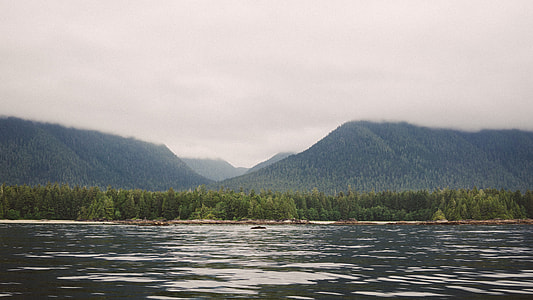 landscape shot of mountain under cloudy sky thumbnail