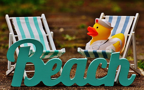two white beach chairs thumbnail