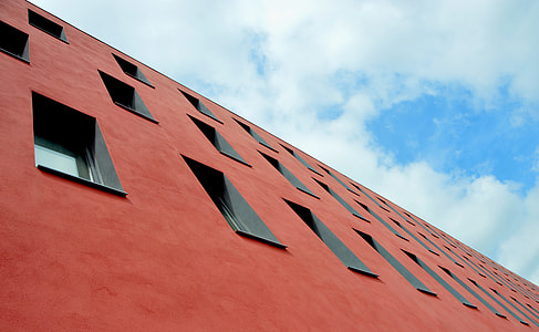 low angle photography of red concrete building thumbnail