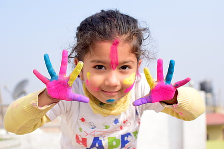 girl with paint on hands thumbnail