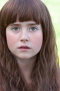 woman with brown long hair thumbnail