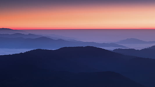 mountain landscape wit fog during sunset thumbnail
