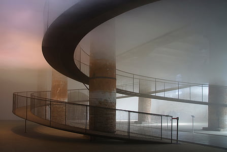 foggy concrete stairway inside building at daytime thumbnail