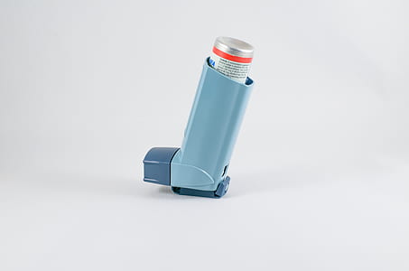 blue inhaler on white surface thumbnail