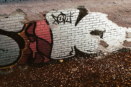 multicolored graffiti on brick wall at daytime thumbnail