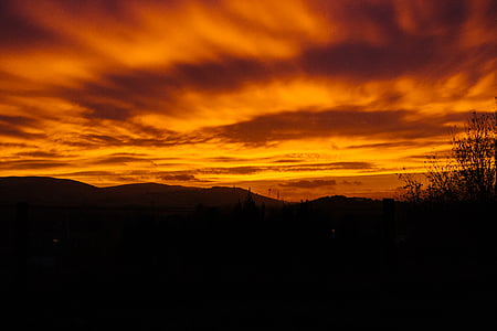 silhouette view of mountains during golden hour thumbnail