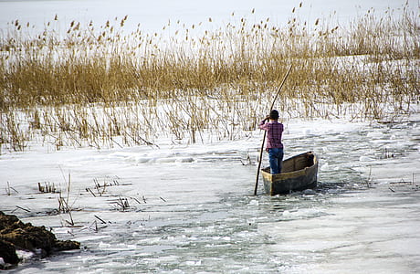 person riding a boat during day time thumbnail