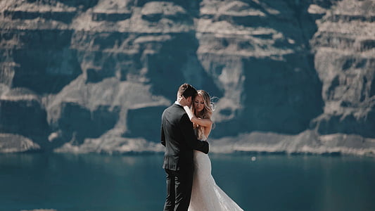 wedding couple near body of water standing thumbnail