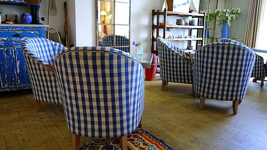 blue and white checked chairs in room thumbnail