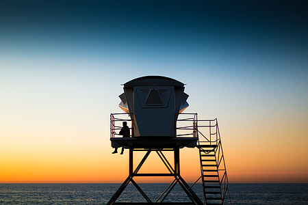 silhouette of person in watchtower thumbnail
