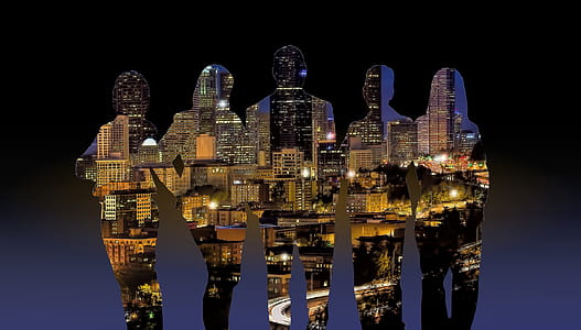 Silhouettes of People Over Cityscape thumbnail