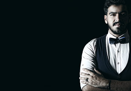 Man Wearing White Shirt and Black Waistcoat thumbnail