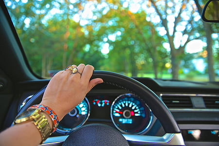 person driving vehicle during daytime thumbnail