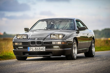 selective focus photography of gray BMW coupe thumbnail