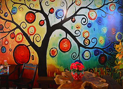 silhouette of tree with multicolored leaf painting thumbnail
