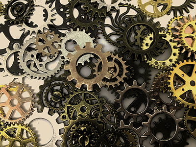 photography of black, gray, and brown steel gears thumbnail