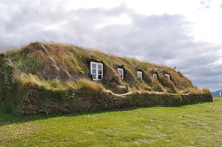 photo of structure covered with grass and soil thumbnail