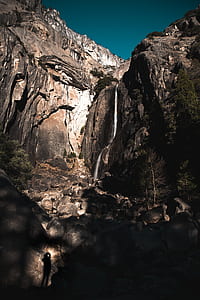 brown mountain under teal sky thumbnail