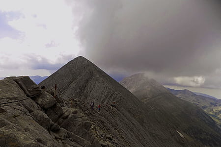 Mountain Range Under Grey Skies thumbnail