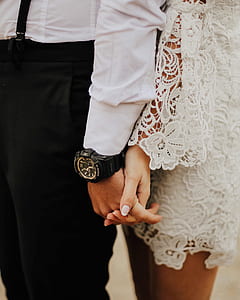 man holding woman hand thumbnail