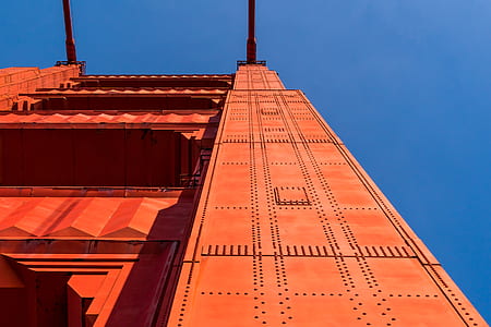 low-angle photography of orange architectural structure thumbnail