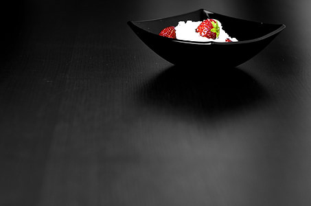black ceramic bowl on top of black surface thumbnail