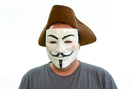 person in gray crew-neck t-shirt wearing mask thumbnail