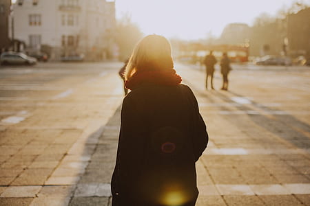 woman wearing black hooded coat thumbnail