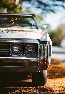 shallow focus photography of vintage white car thumbnail
