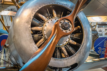 gray and brass-colored plane thumbnail