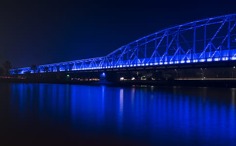 truss bridge during nighttime thumbnail