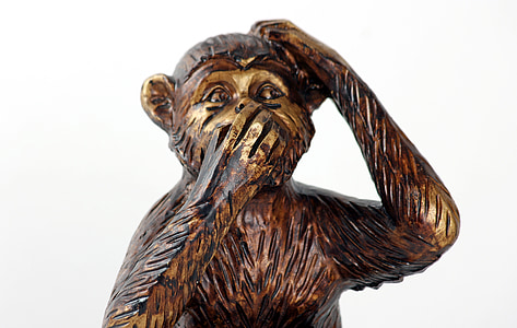 mouth can't speak monkey figurine thumbnail