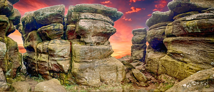 brown rocks under red sky thumbnail
