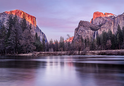 mountain peak near body of water thumbnail