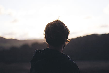 macro shot photography of man in black jacket thumbnail