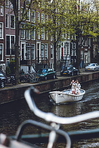 two women standing on white boat thumbnail