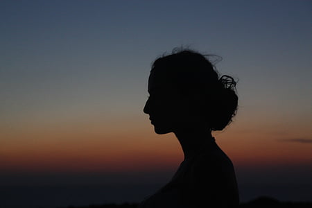 silhouette photo of person's face during nighttime thumbnail