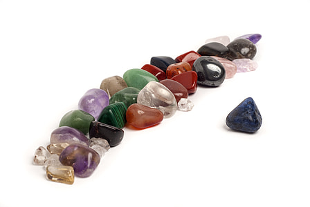 red-blue-gray multi-colored pebbles on white surface thumbnail