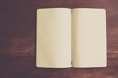 blank notebook on wooden surface thumbnail
