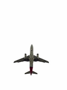 white airplane flying during daytime thumbnail