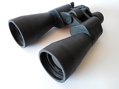 black binoculars on white panel thumbnail