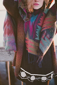 woman wearing black and white coat during daytime thumbnail