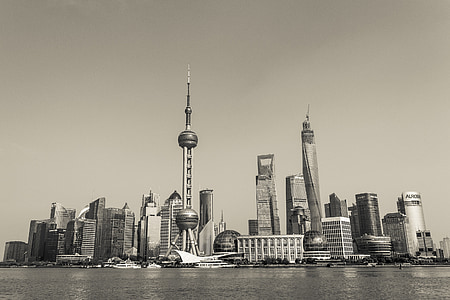 high-rise buildings near body of water thumbnail