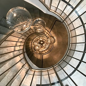 top view photography of spiral staircase thumbnail