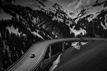 Grey Car on Road Near Snow Covered Mountain thumbnail